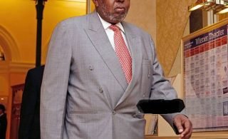 Vienna, AUSTRIA: Angola oil minister Desiderio da Graca Verissimo e Costa arrives at a Vienna Hotel 14 March 2007 on the eve of ' Organization of Petroleum Exporting Countries (OPEC) ministerial meeting. A number of ministers addressed local media agencies before departing for Vienna, where OPEC is headquartered, and agreed that oil prices were sitting at a comfortable level, around 60 dollars a barrel. AFP PHOTO/DIETER NAGL (Photo credit should read DIETER NAGL/AFP via Getty Images)